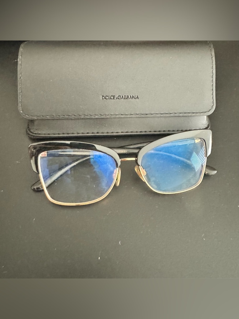 Dolce & Gabbana Black Frame Sunglasses with Blue Lenses